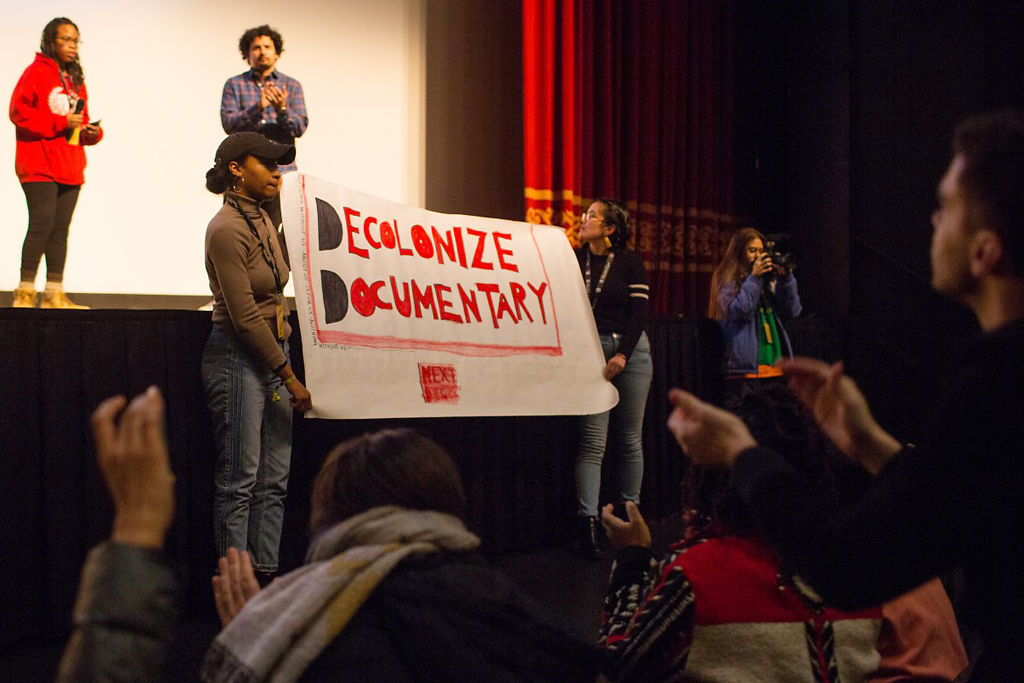Students protest at the screening of "The Commons"